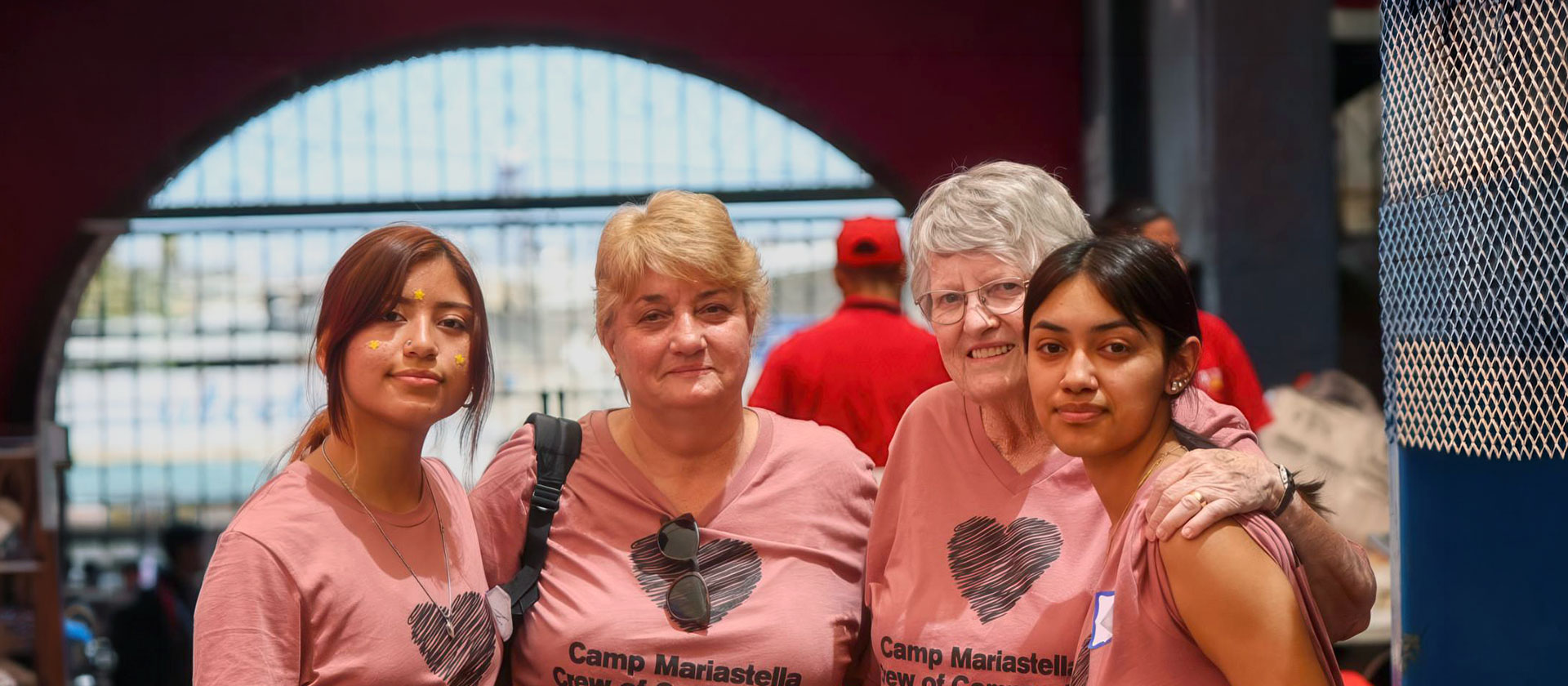 Sisters with a couple young volunteers